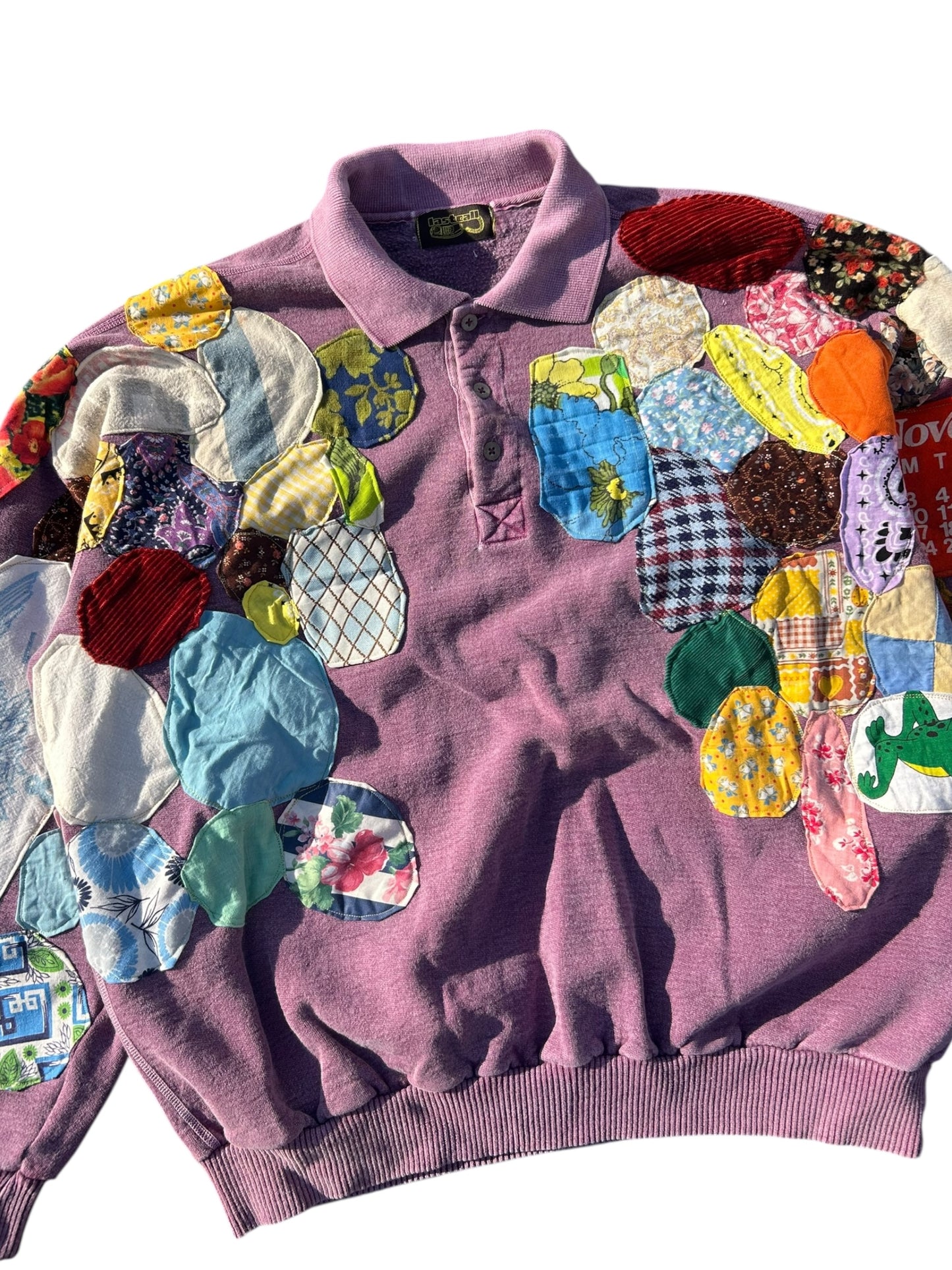 Patched up vintage purple sweater