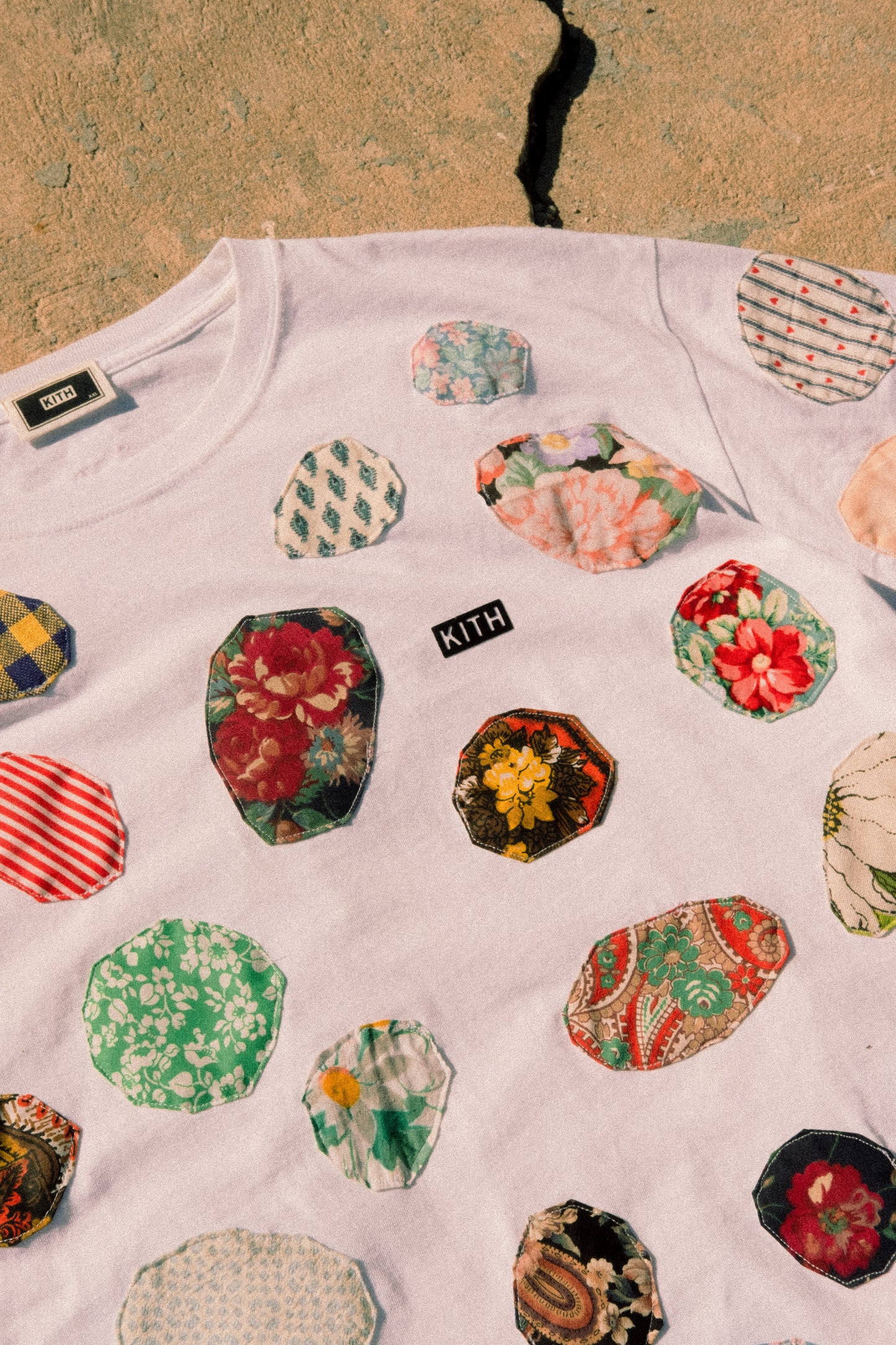 patched up kith tee