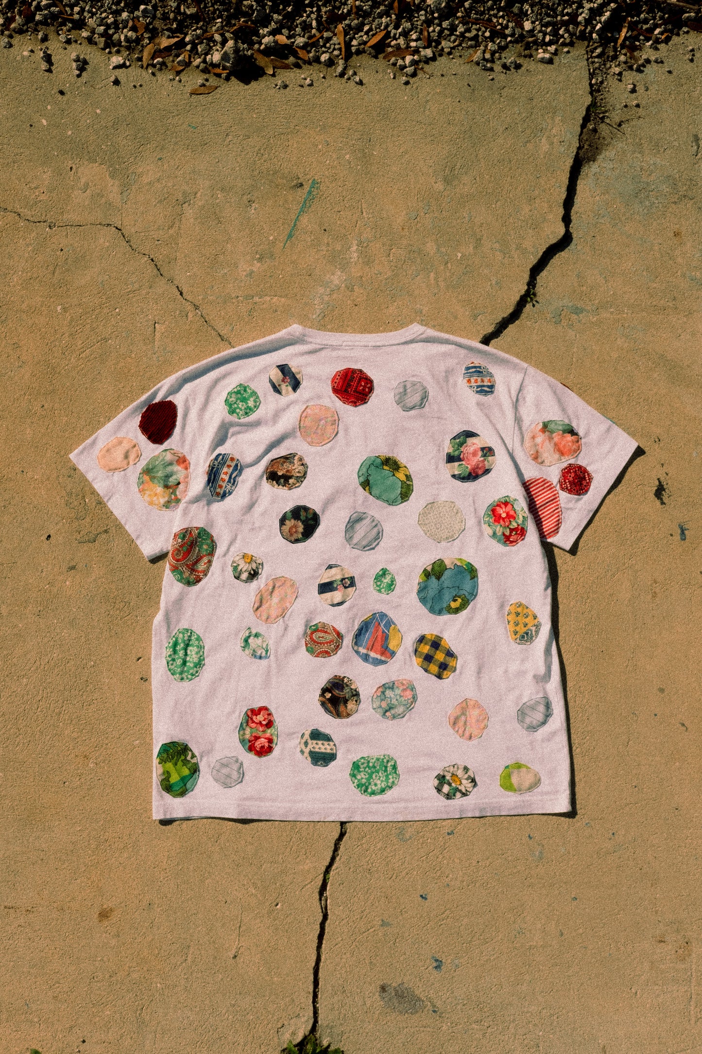 patched up kith tee