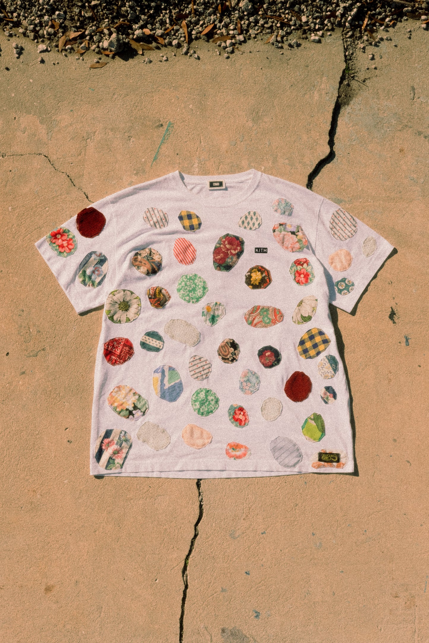 patched up kith tee