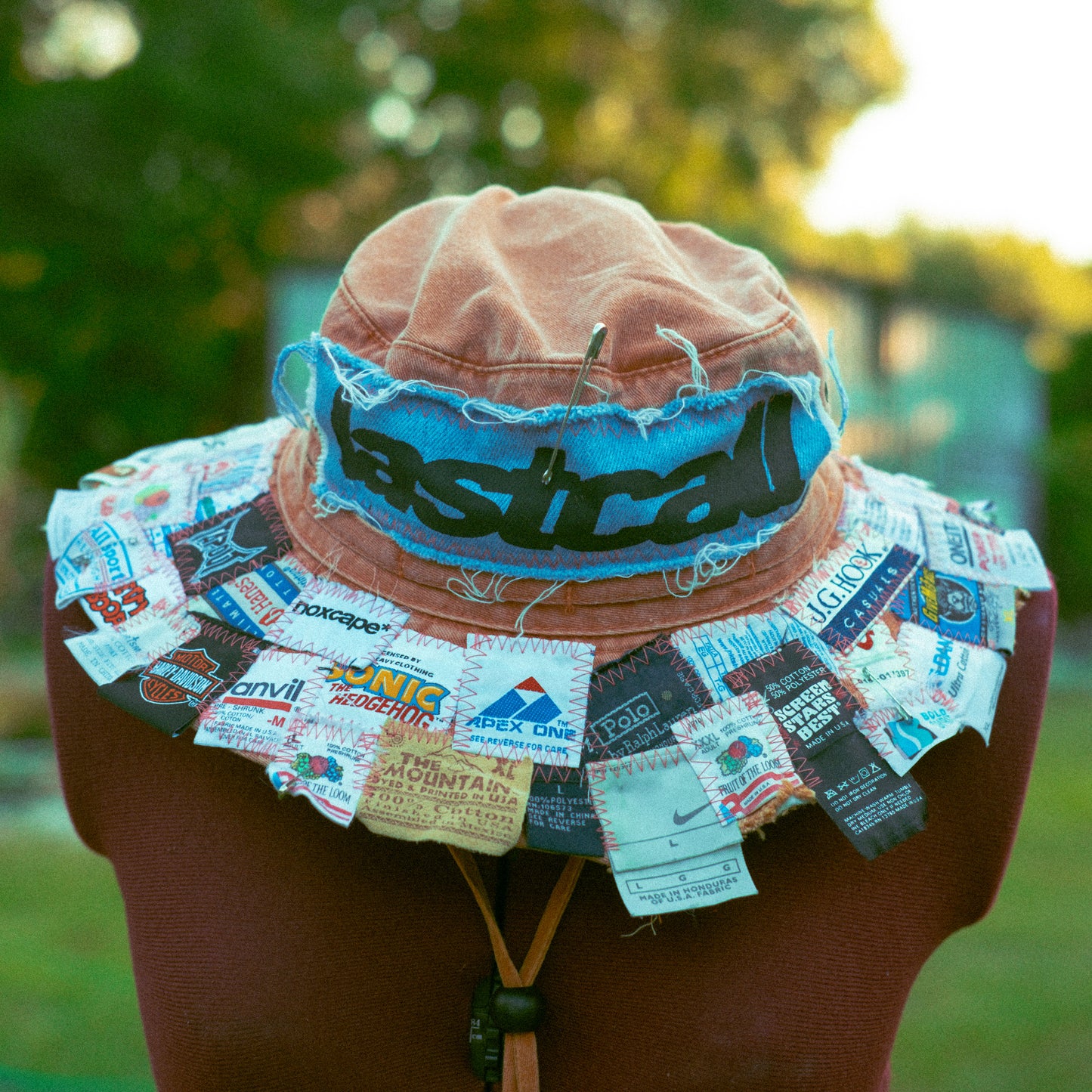 FADED ORANGE TAG PATCHED BUCKET HAT