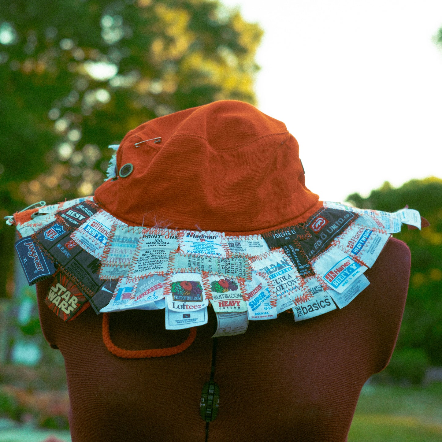 ORANGE TAG PATCHED BUCKET HAT