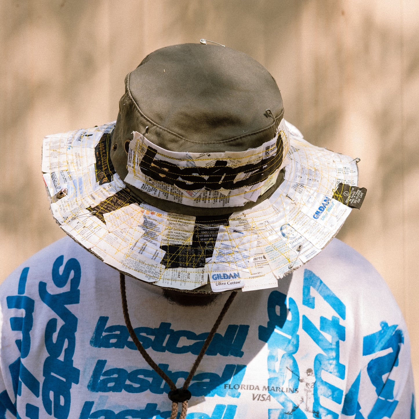 grey tagged bucket hat