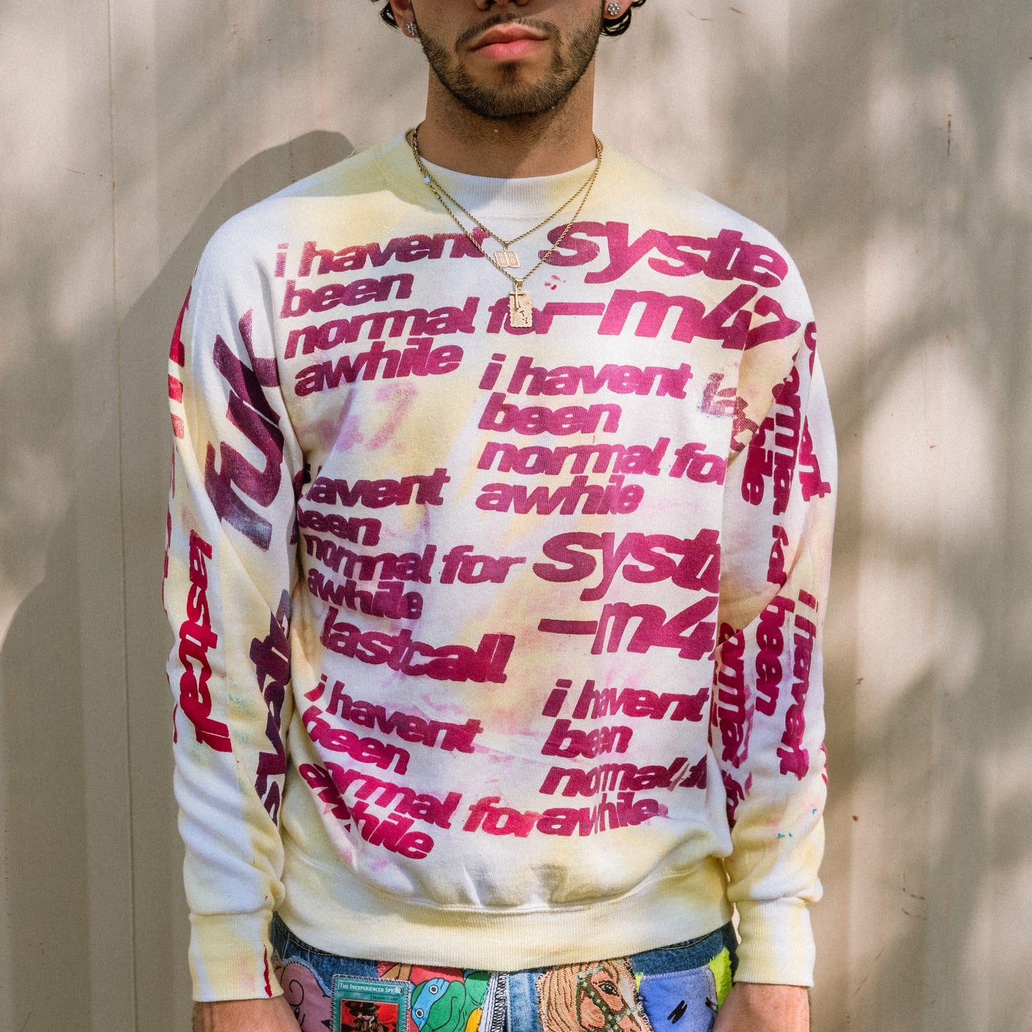 all over screen print sweater