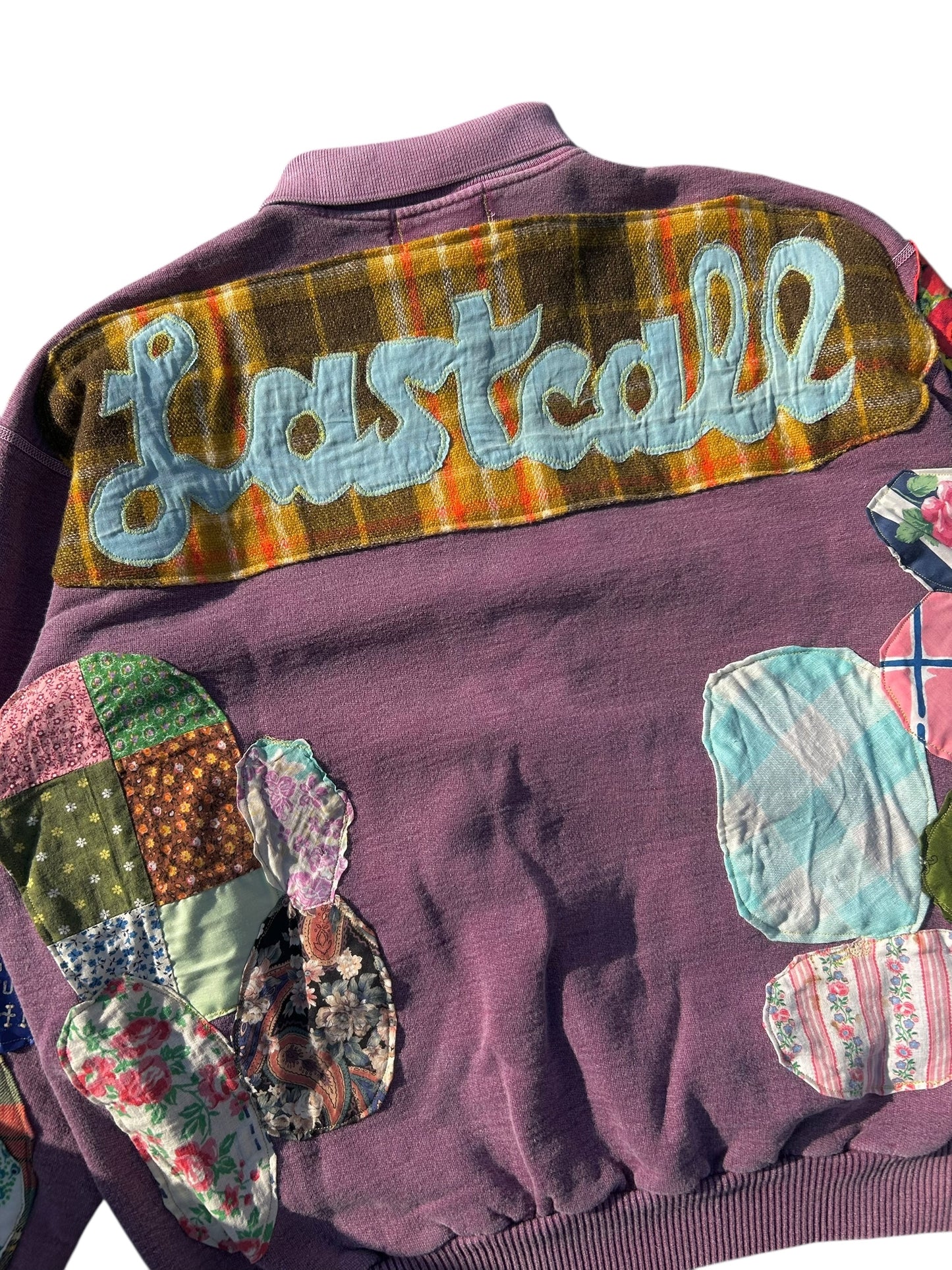 Patched up vintage purple sweater