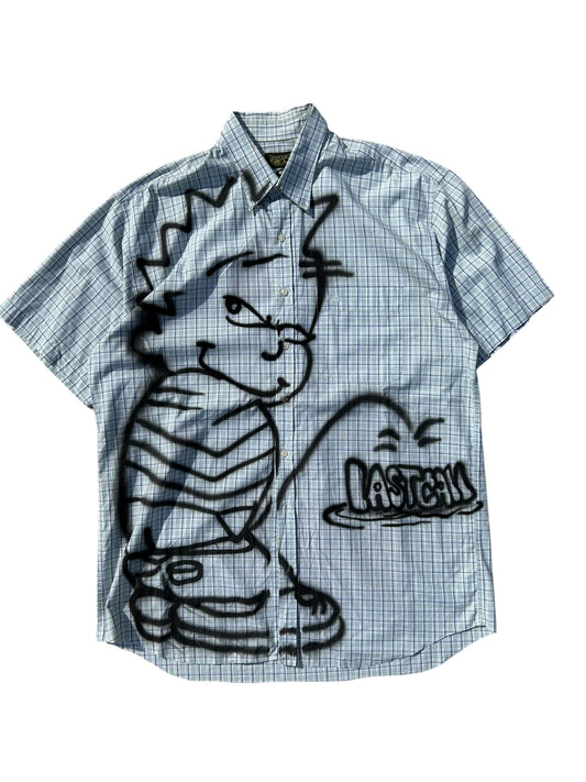 Calvin pissing on lastcall button shirt 01