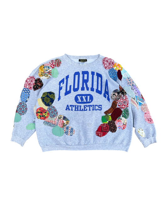 Patched up vintage Florida sweater
