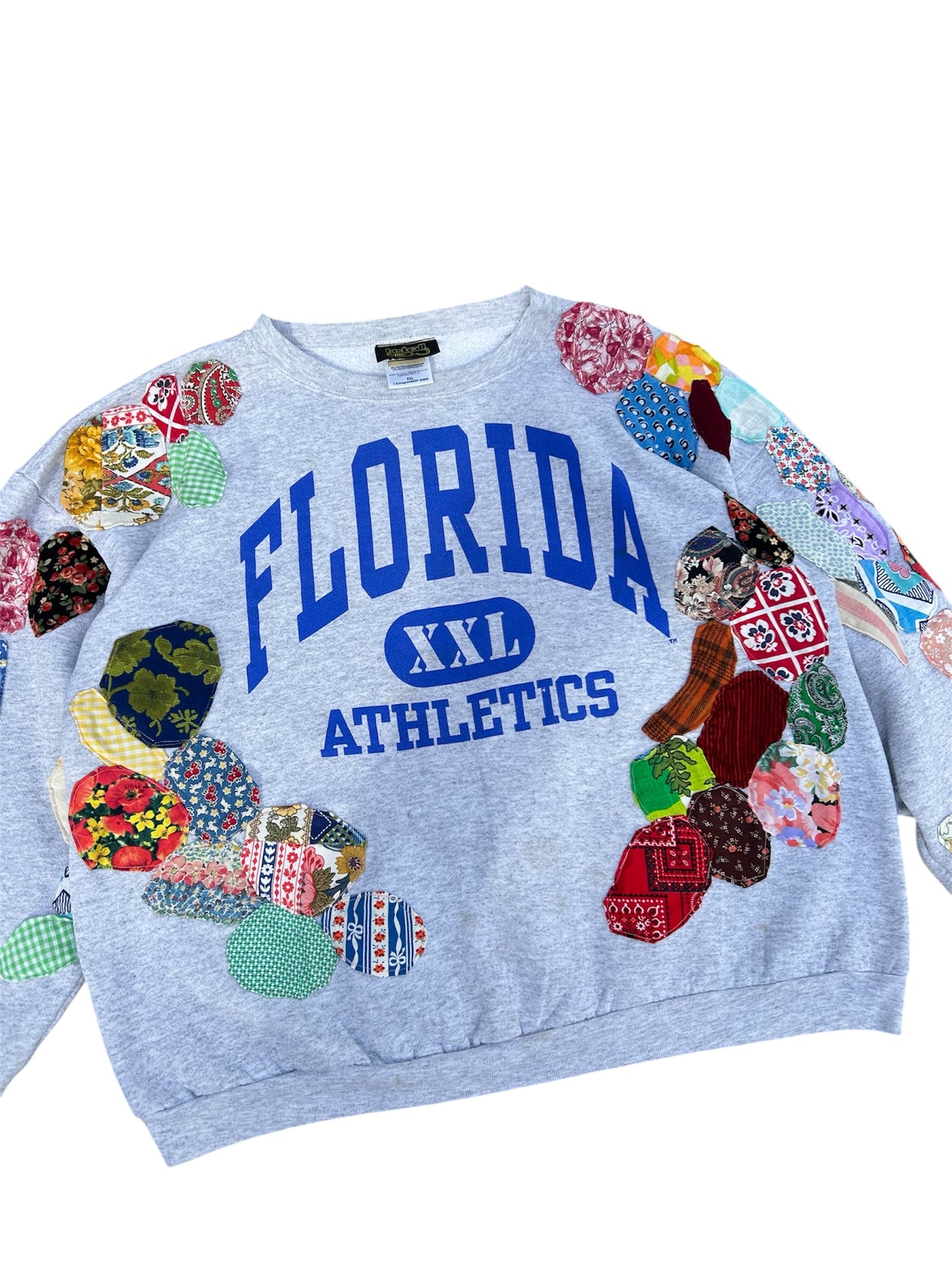 Patched up vintage Florida sweater