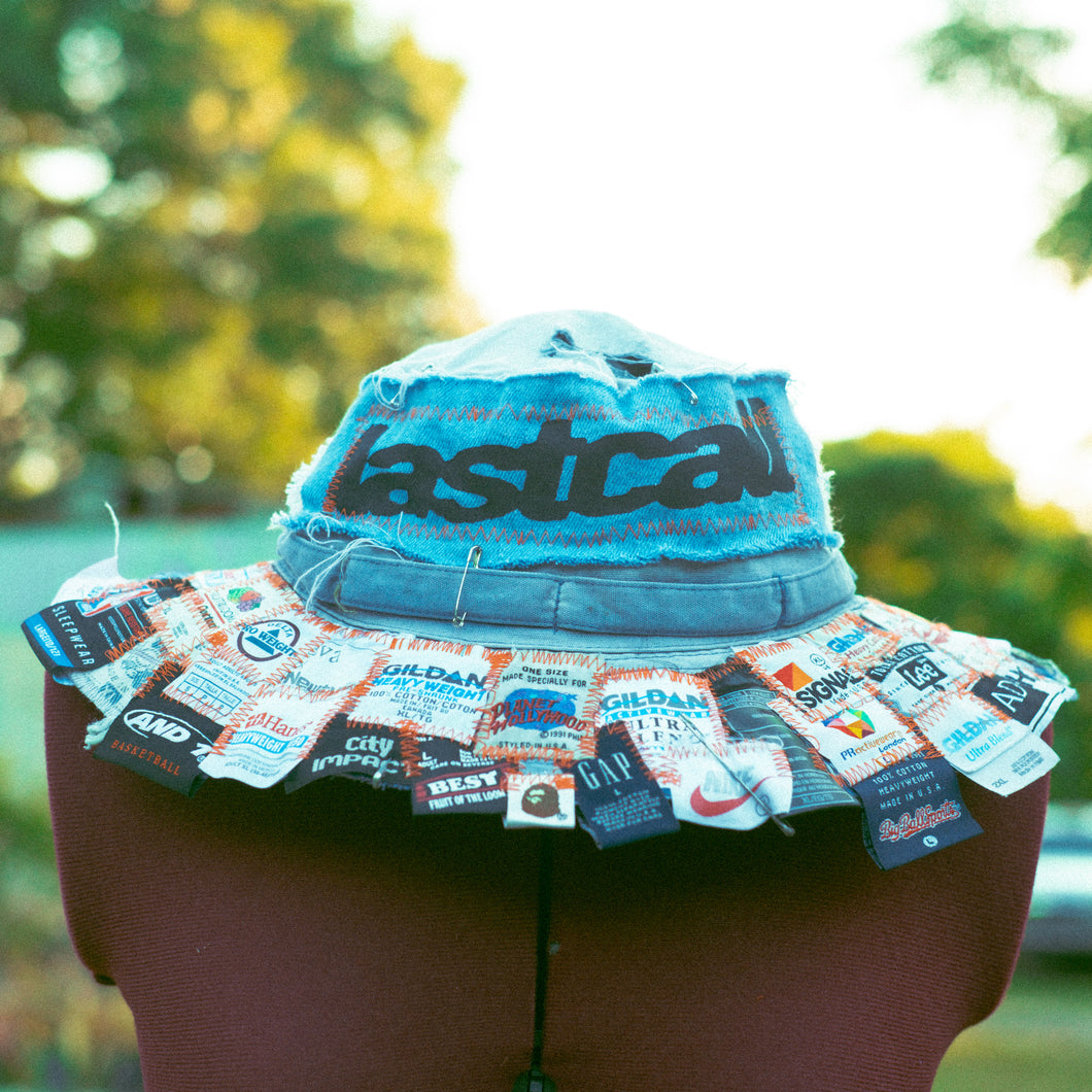 FADED BLUE TAG PATCHED BUCKET HAT