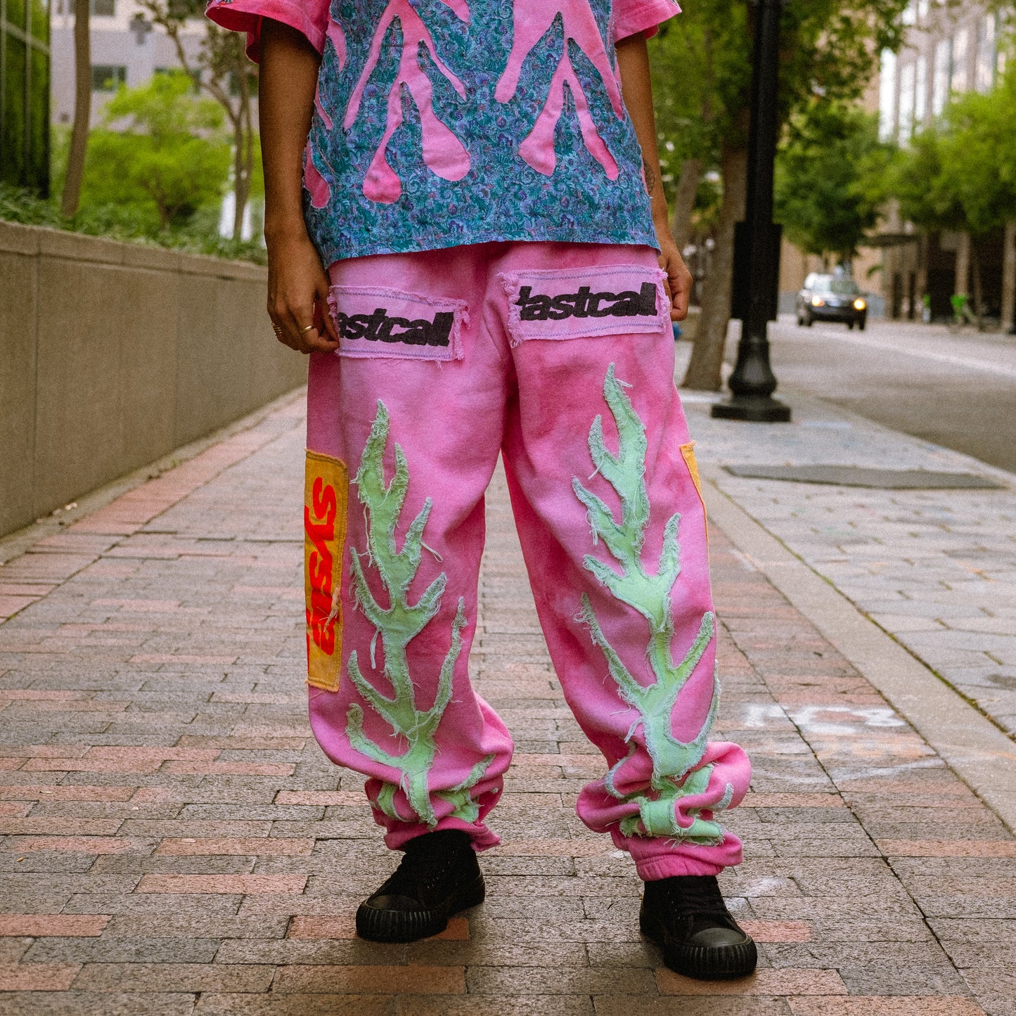 dyed pink flame sweatpants