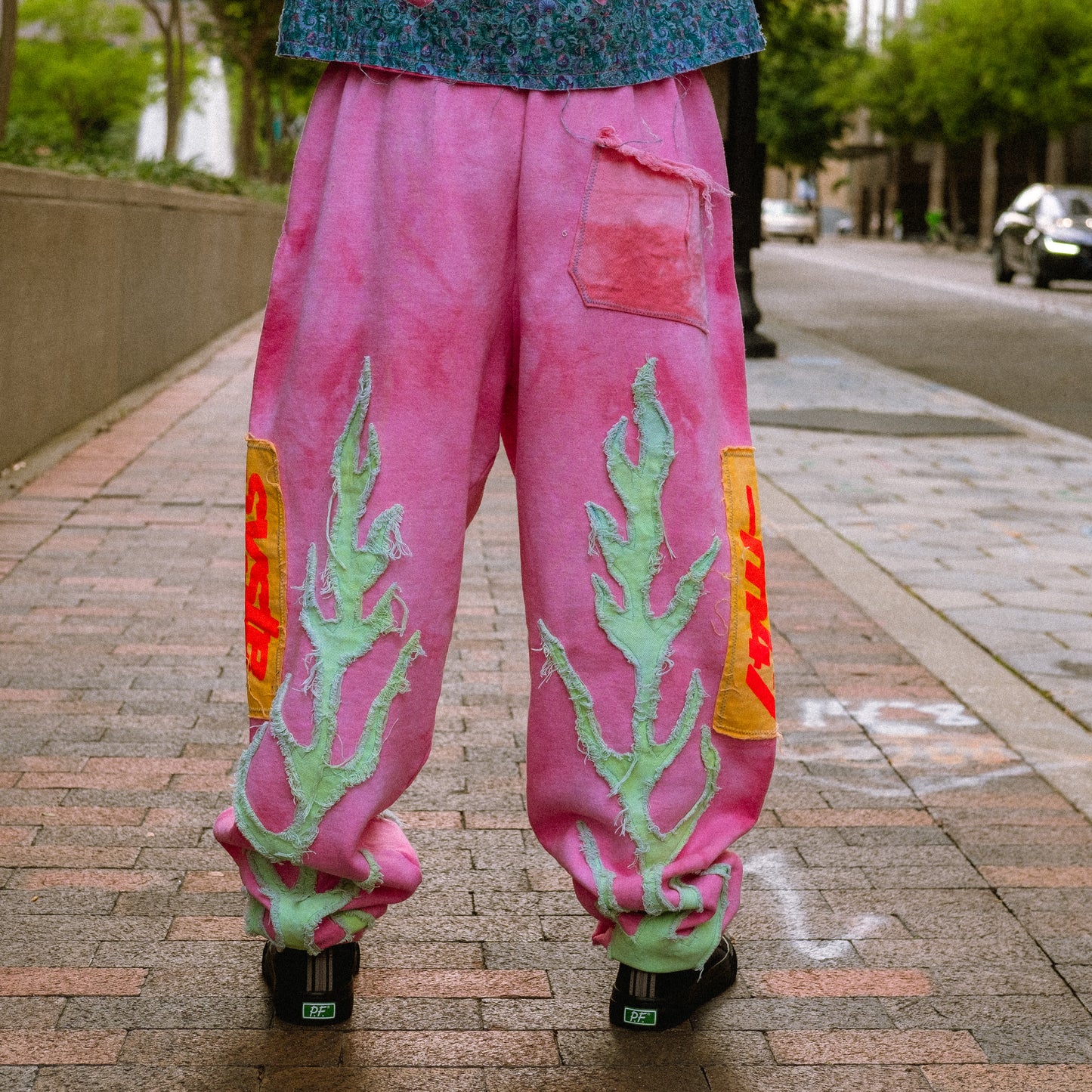 dyed pink flame sweatpants