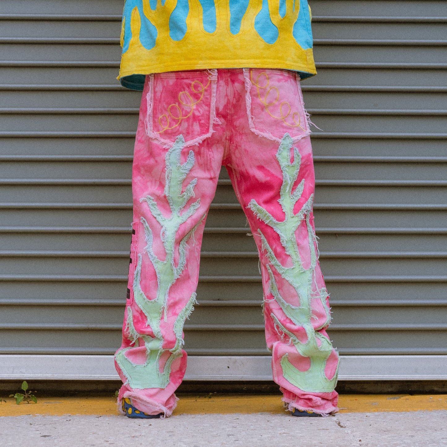 pink acidwash flame jeans