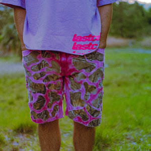 dyed pink camo wavy shorts